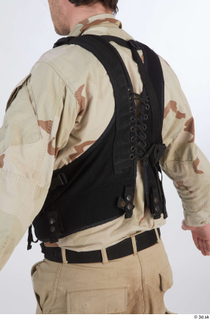 Reece Bates Contractor A pose 1 army vest upper body…